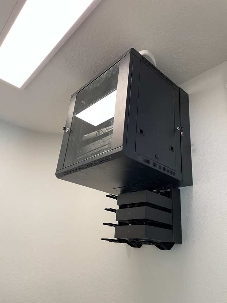 Wall-mounted media and network rack